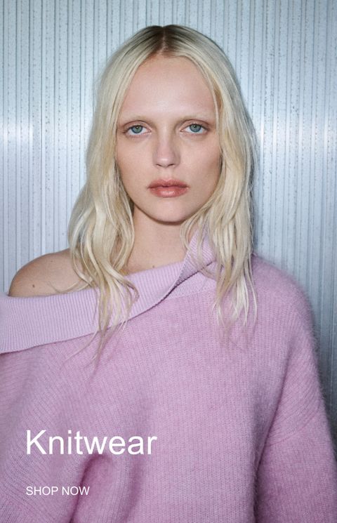 A person with long blonde hair wearing a pink knit sweater with "Knitwear" and "Shop Now" text. Vertical striped background.