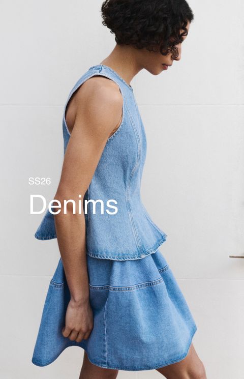 Woman in sleeveless denim peplum top and skirt, labeled SS26 Denims, standing against a white background.