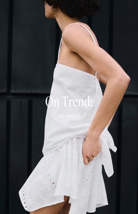 Person in an all-white dress against a dark background with text saying "On Trend: ALL-WHITE."