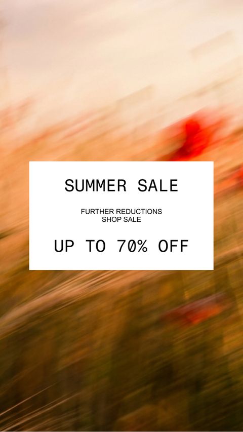 Blurry field with red flowers and a white text box announcing a summer sale with up to 70% off.