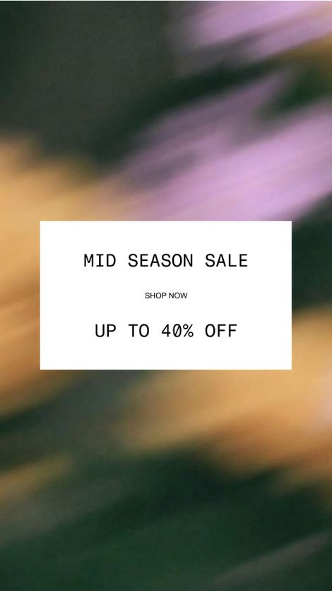 Blurry background with a white box displaying text: "Mid Season Sale, Shop Now, Up to 40% Off."