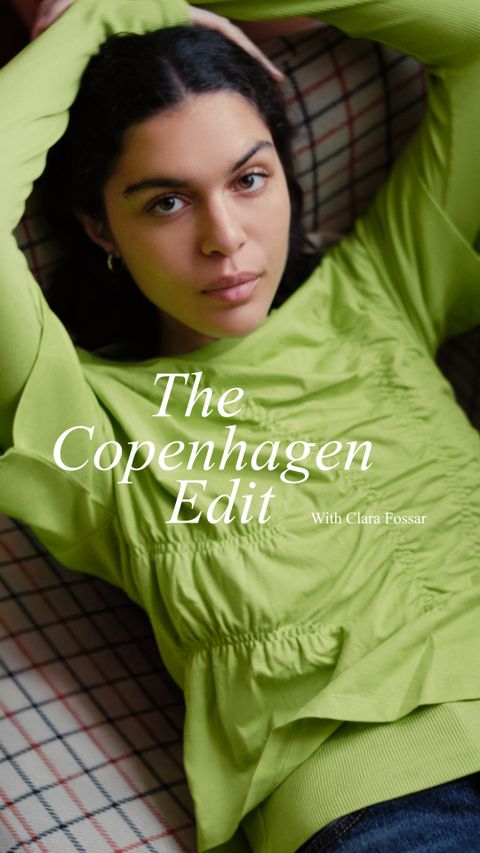 Woman in a lime green top lying on a checkered fabric, with text "The Copenhagen Edit with Clara Fossar" overlayed.