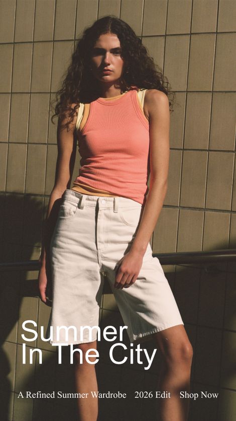 Woman in a pink tank top and white shorts standing against a tiled wall with "Summer In The City" text overlay.