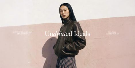 Model in a dark leather jacket and plaid skirt stands against a textured pink wall. Text reads "Undiluted Ideals," "Between Reality and Imagination," "Pre-Fall Collection '26."