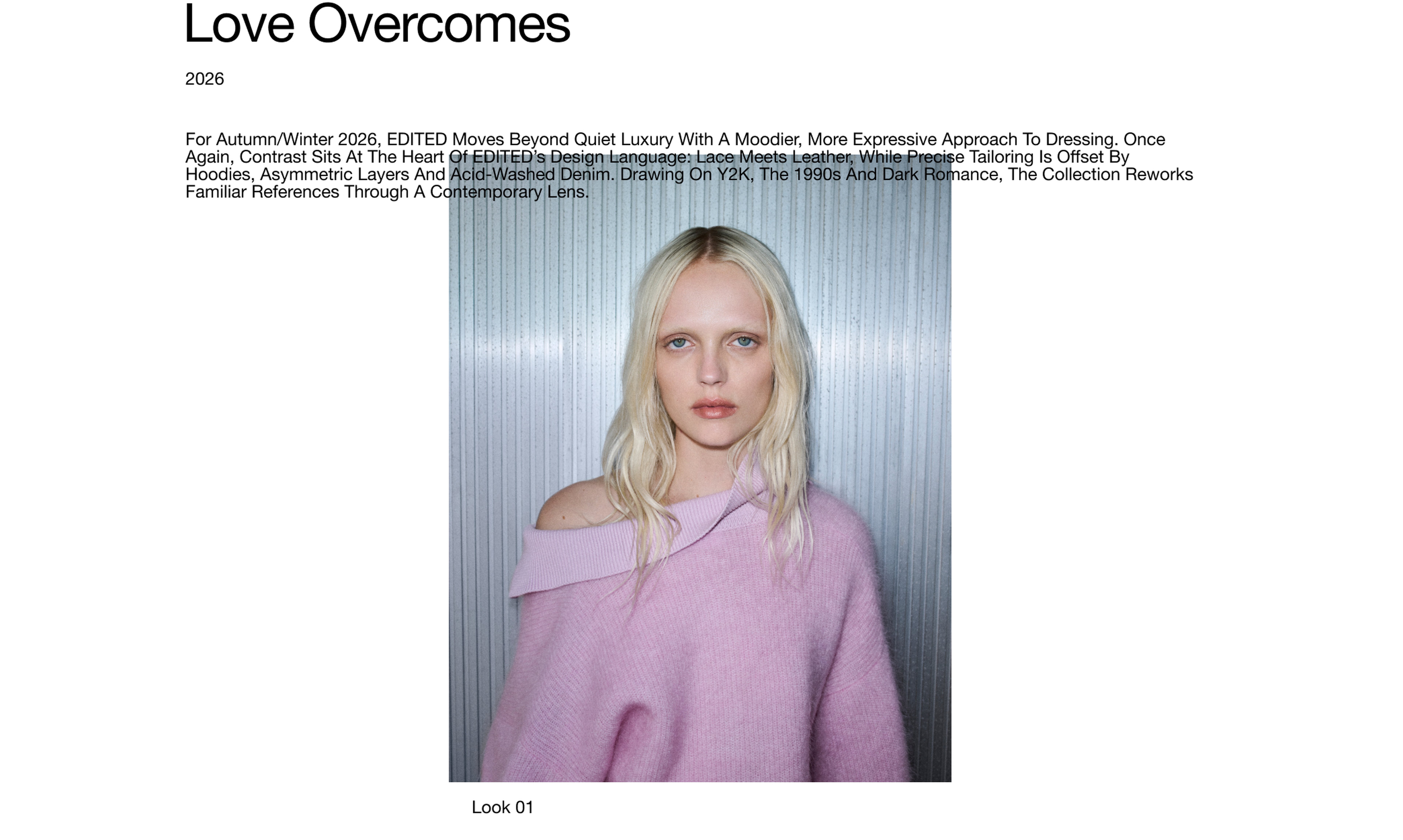 Blonde woman in a light pink, off-the-shoulder sweater against a corrugated backdrop, text above reads "Love Overcomes 2026".