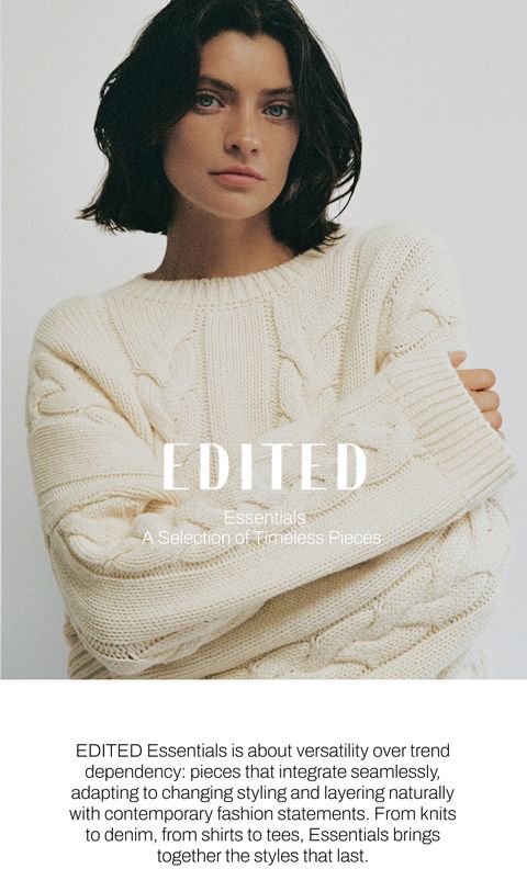 A person wearing a cream-colored knitted sweater, labeled "EDITED Essentials: A Selection of Timeless Pieces."