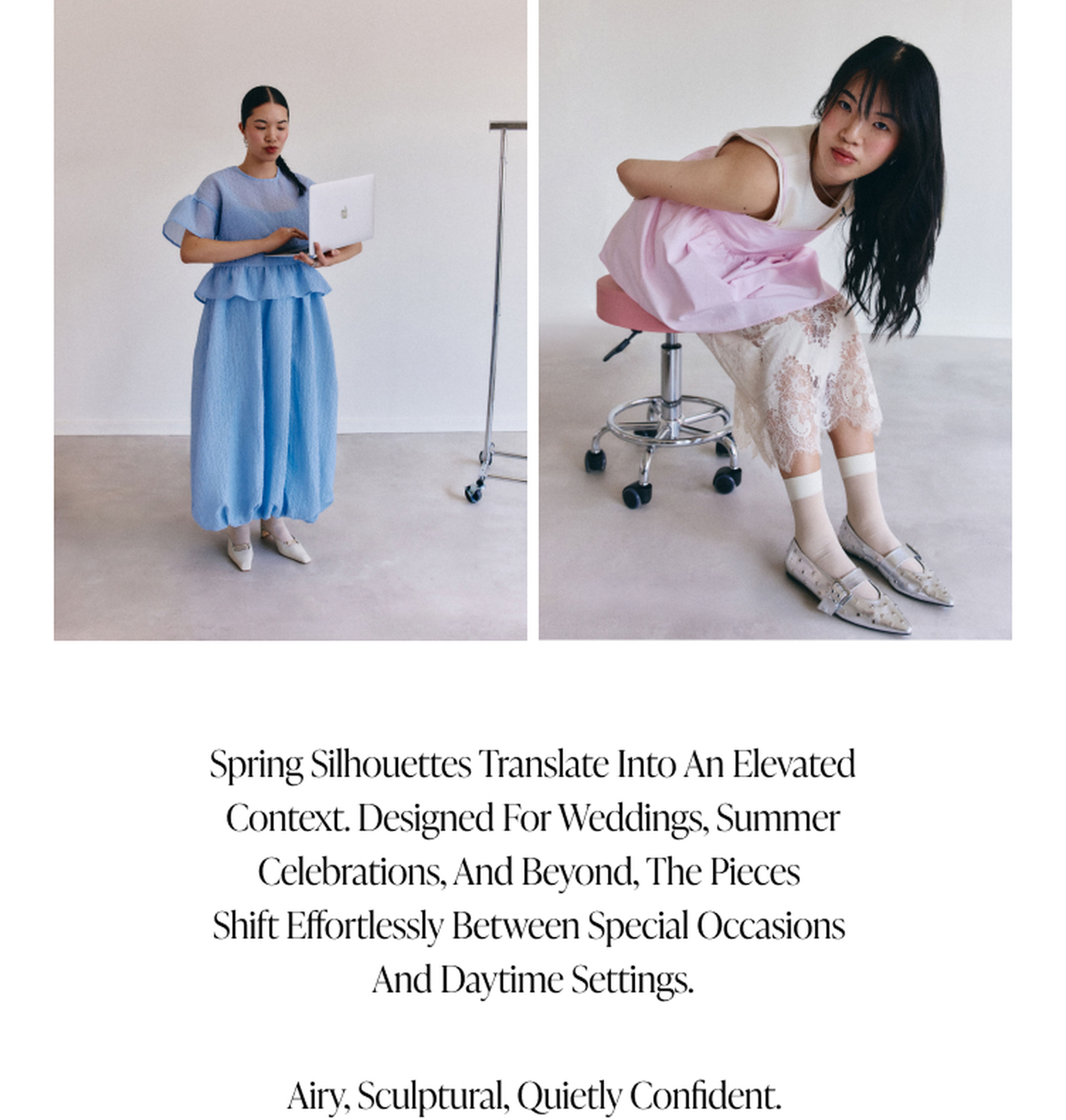 Two women modeling spring outfits: one in a blue dress with a laptop, another in pink and lace on a stool. Elegant and airy styles.