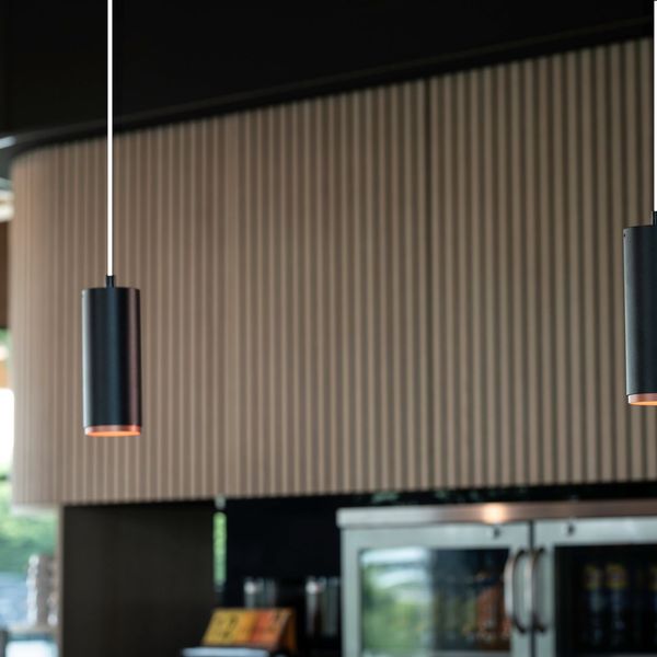 NUMINOS® Pendelleuchte mit passendem Frontring in der Trendfarbe Kupfer.