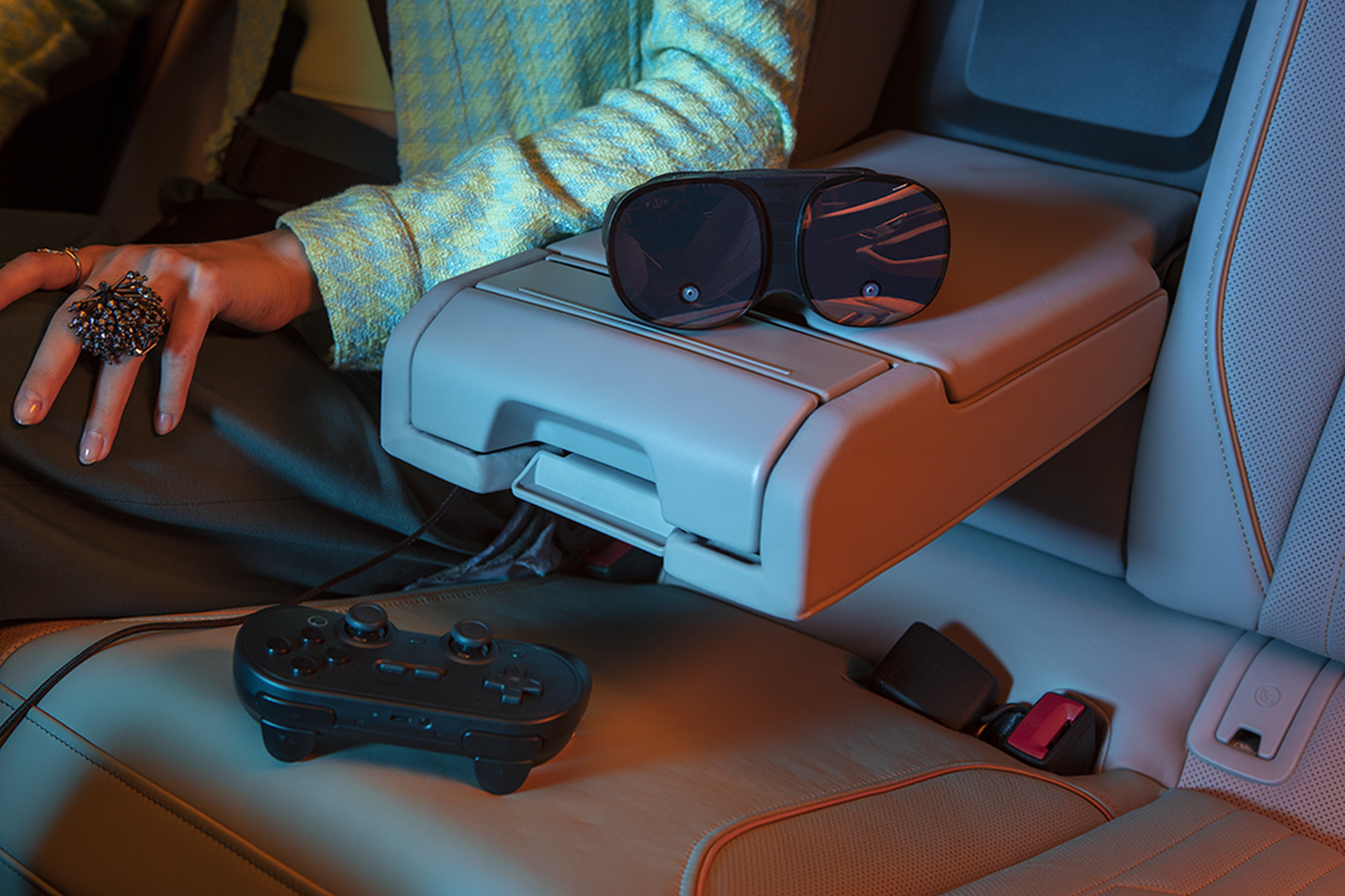 backset of the car with headset and gamepad