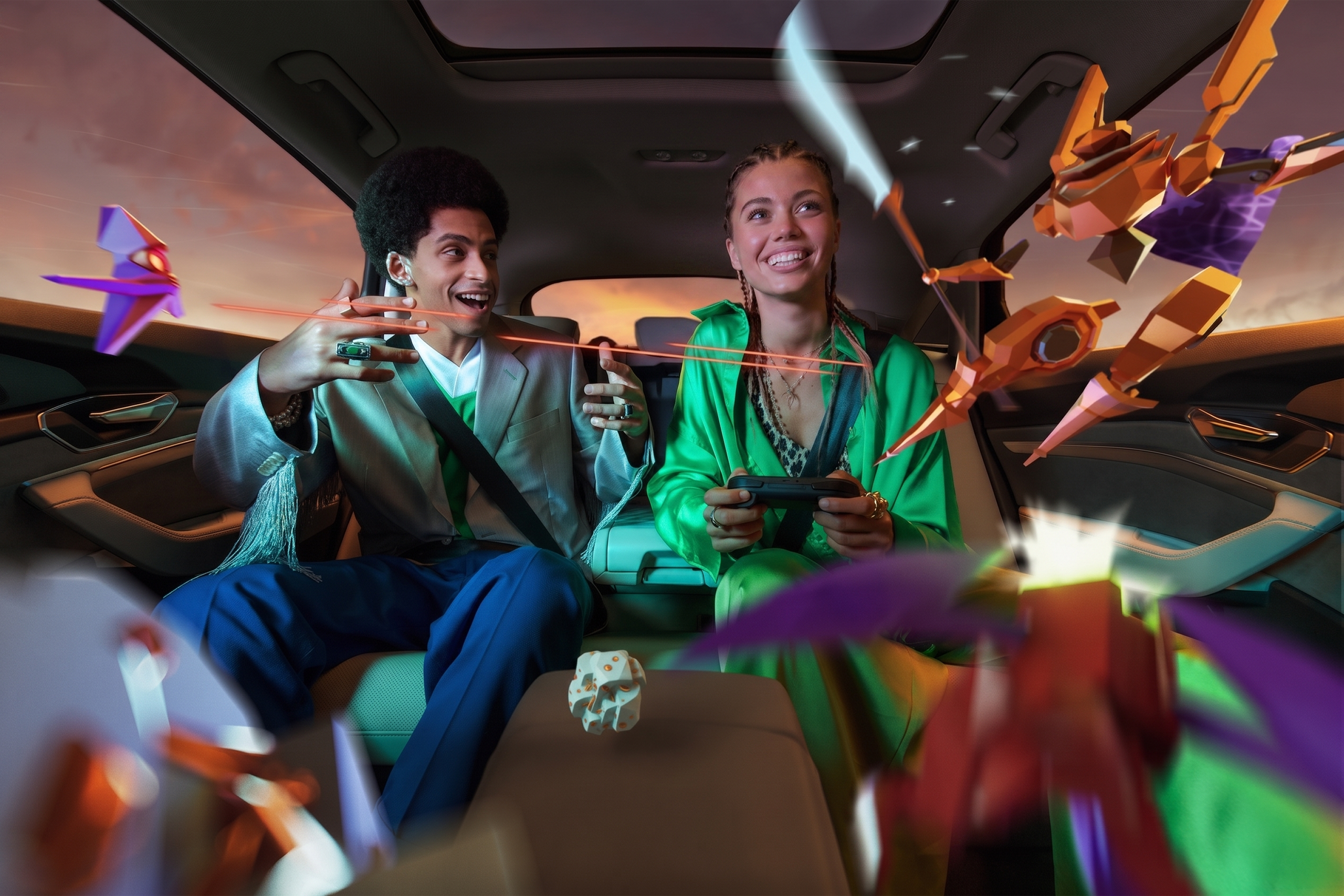 two people in the backseat, immersed into a game