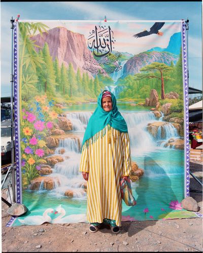 Woman in vibrant dress and background