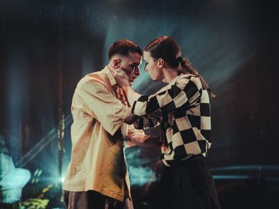 two people performing a dance performance