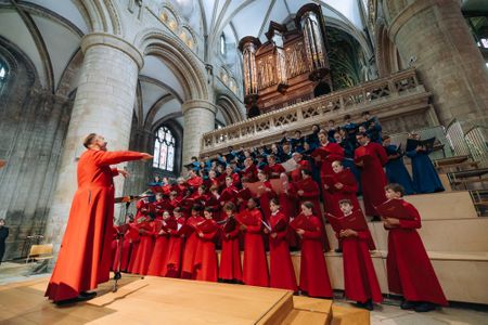 Gloucester Cathedral choir with organ at Organ Dedication event