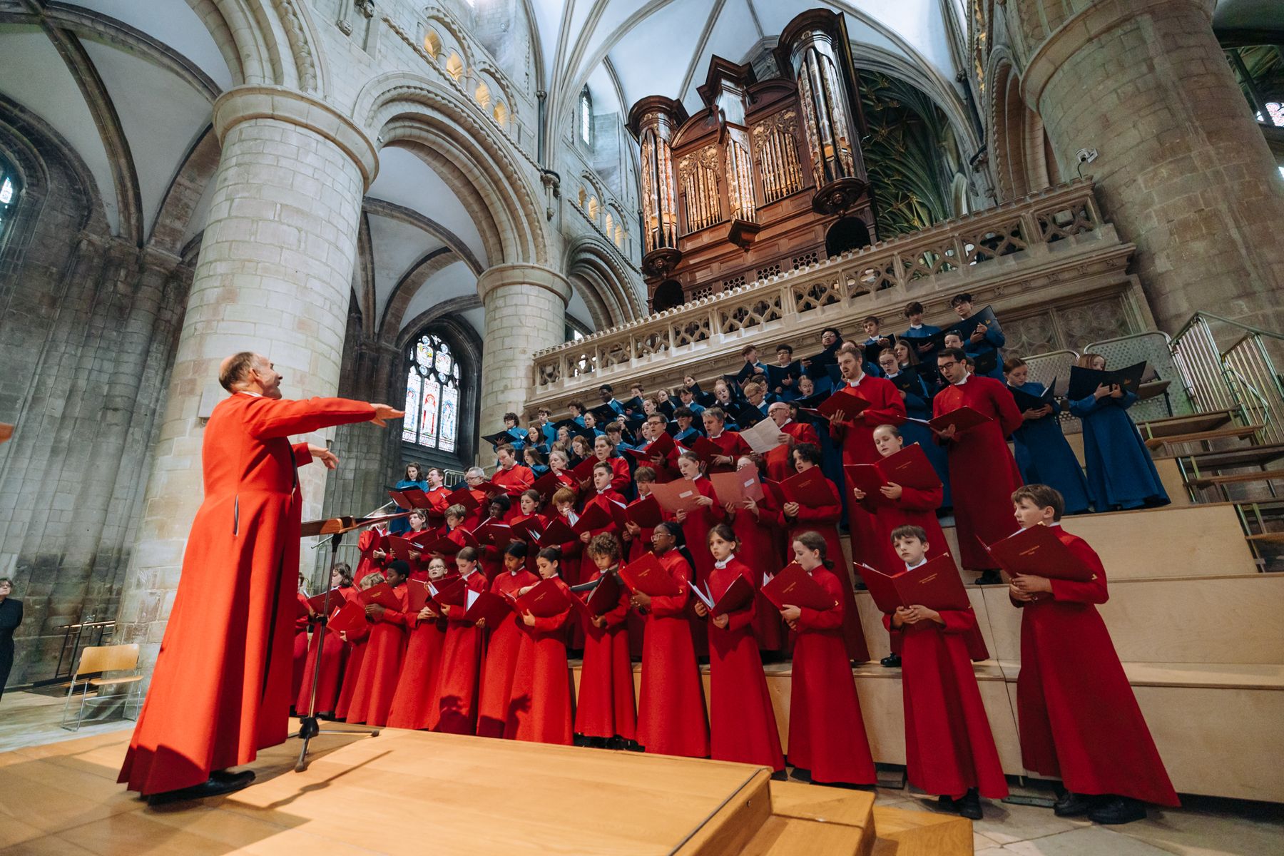 Dedication of the Cathedral organ service - photo of choir signing