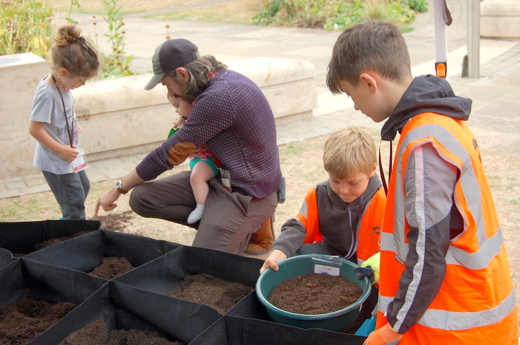 Festival of Archaeology Family Day children digging