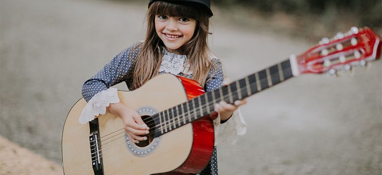 Guitar playing girl