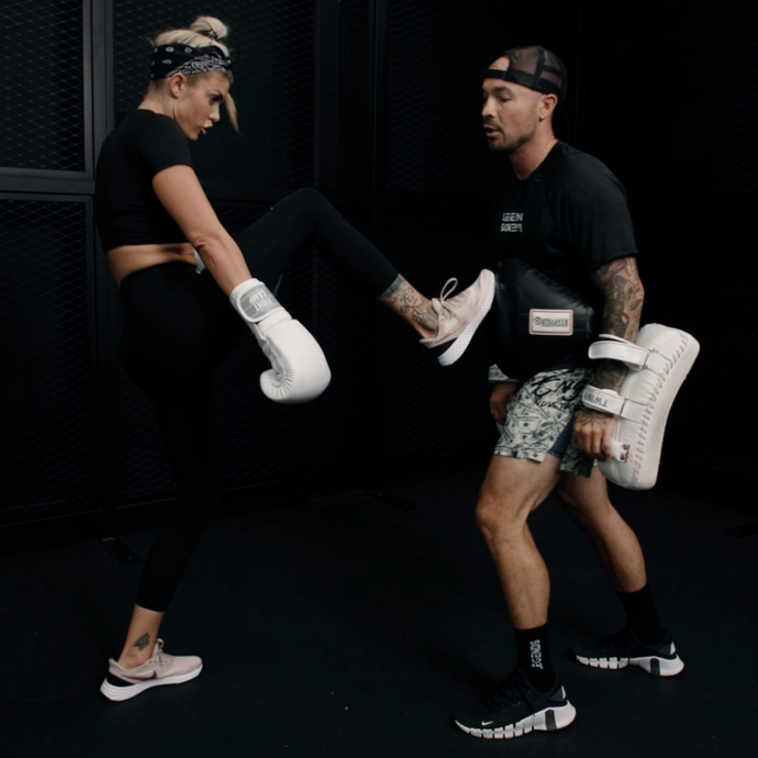 Aaron Swenson showing how to use a belly pad for front kicks