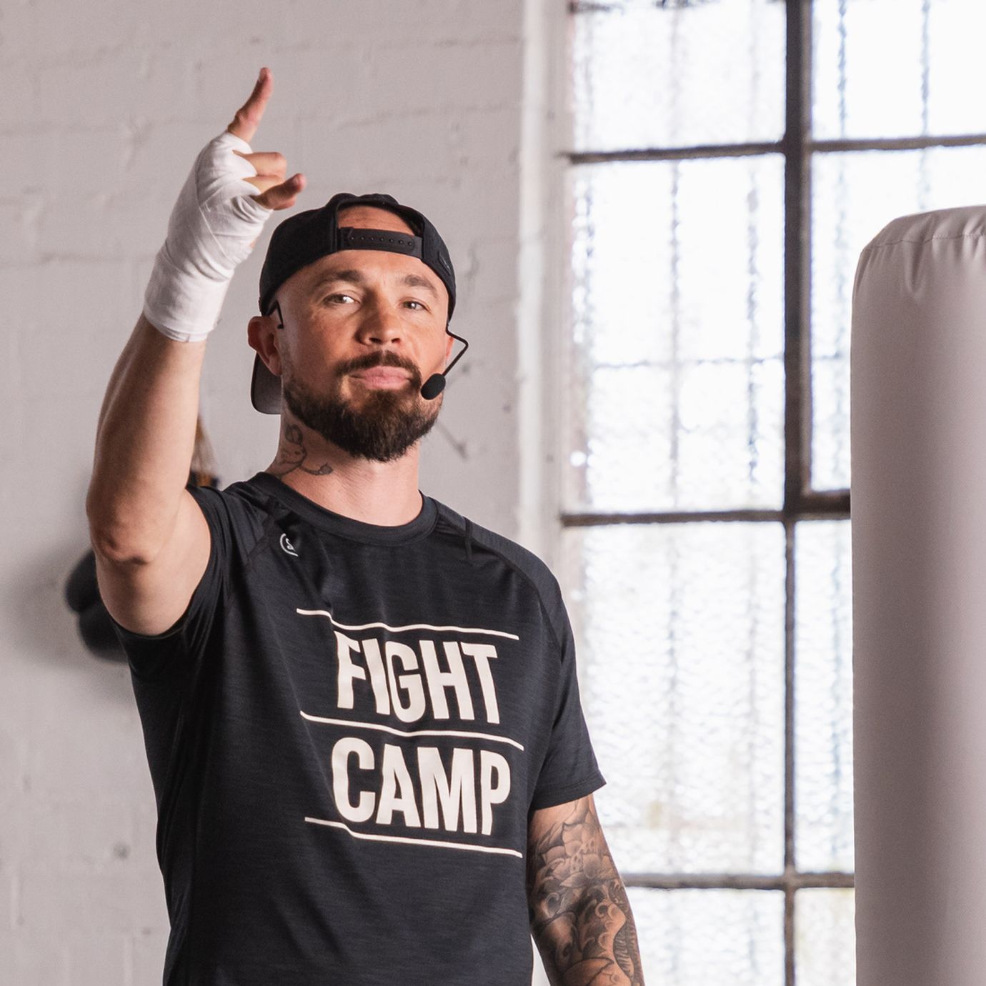 FightCamp Trainer Aaron Swenson Doing A Workout