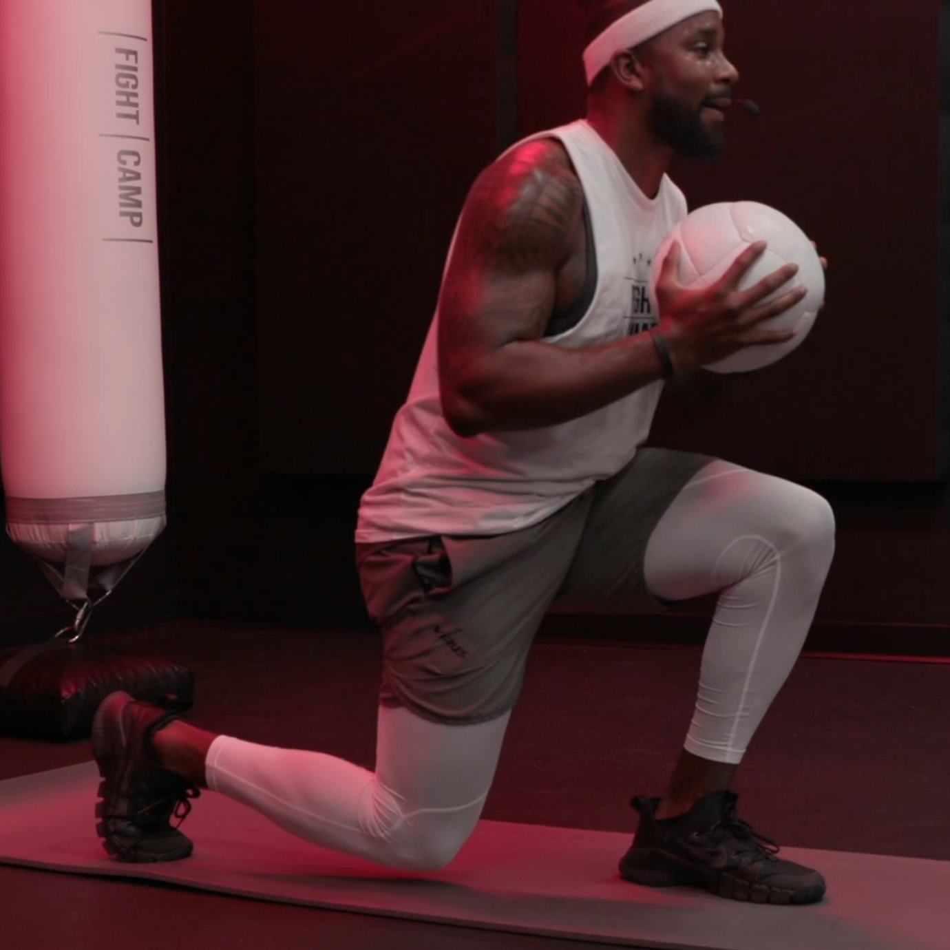 Coach PJ Doing Medicine Ball Jump Lunges