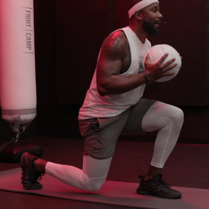 Coach PJ Doing Medicine Ball Jump Lunges