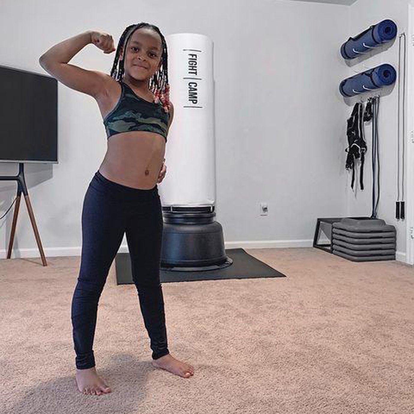 FightCamp Girl Flexing Her Muscles