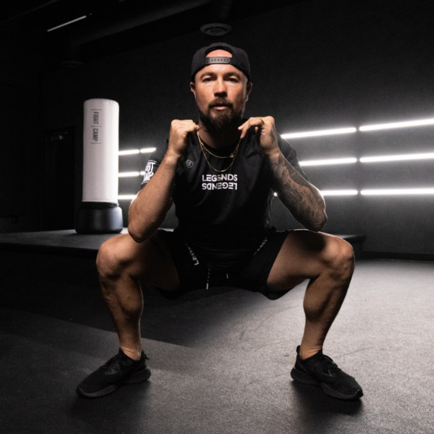 Aaron Swenson Doing Sumo Squats