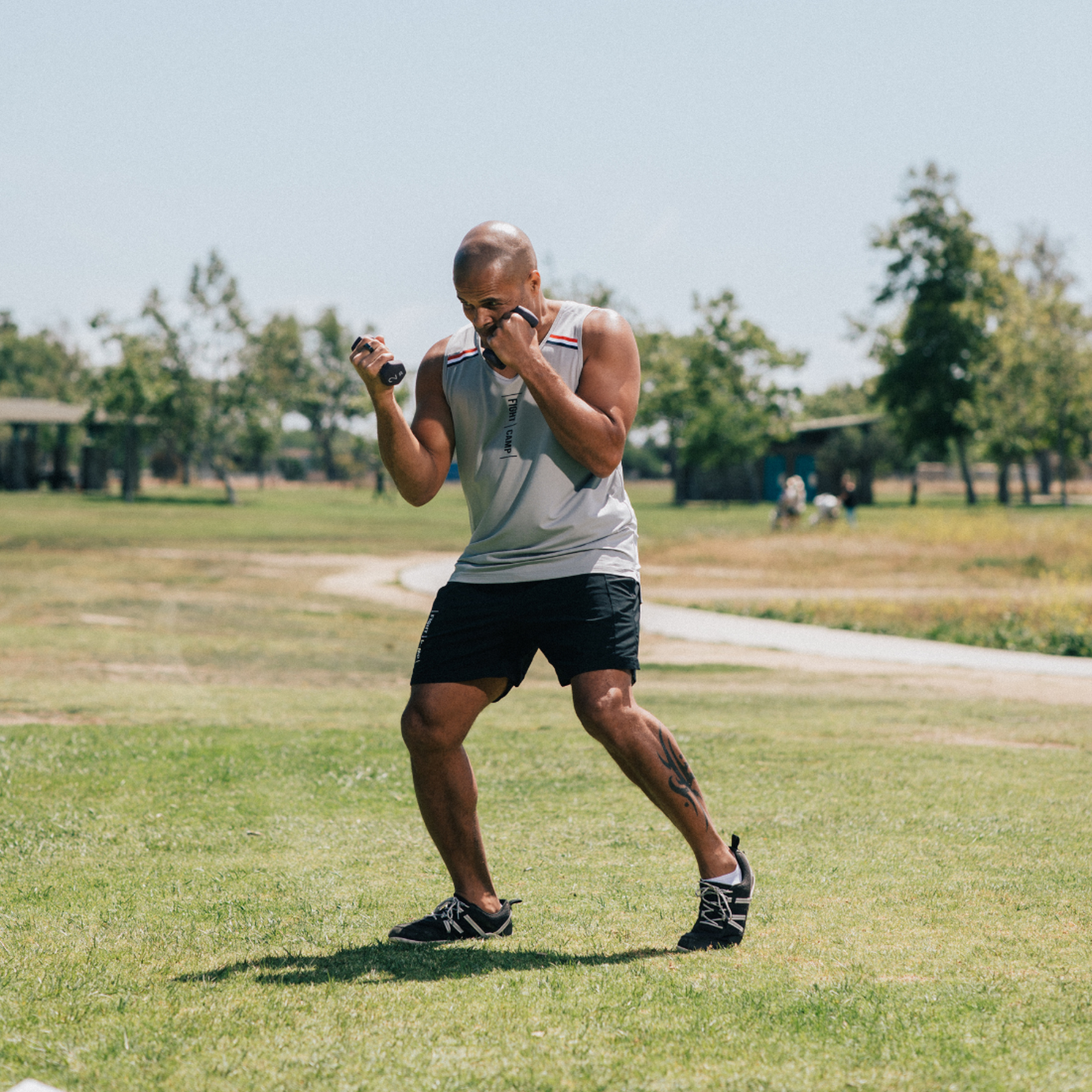 Shadowboxing with hand weights for cardiovascular conditioning