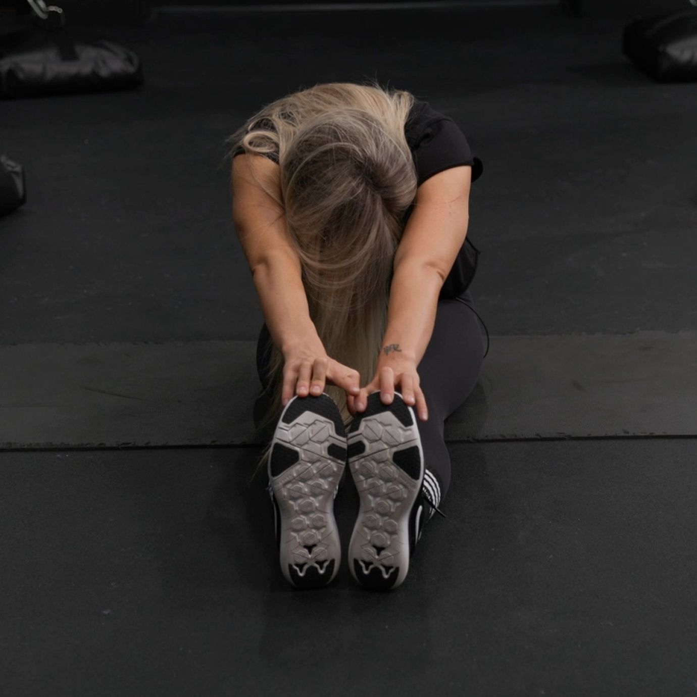 Shanie Smash Doing a Reach For Your Toes Stretch