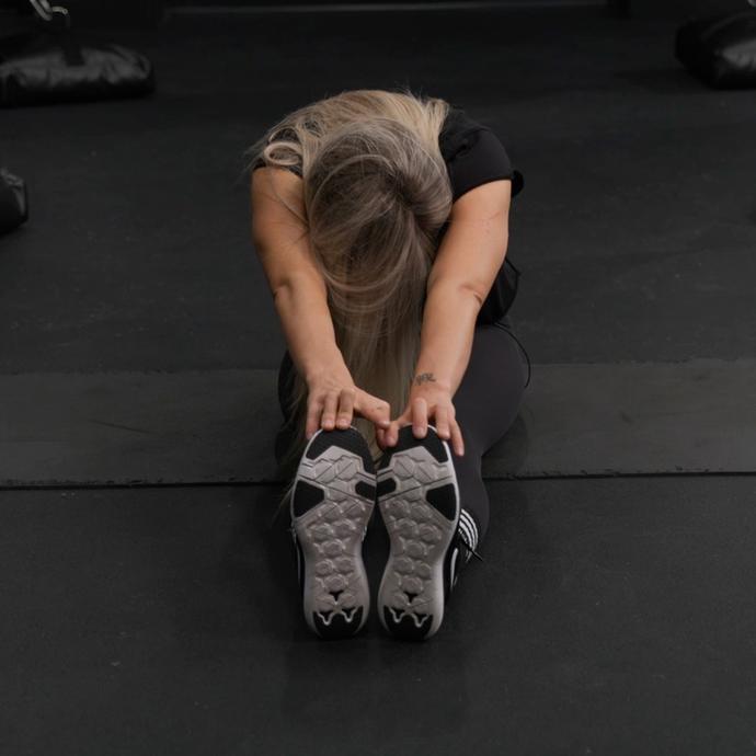 Shanie Smash Doing a Reach For Your Toes Stretch