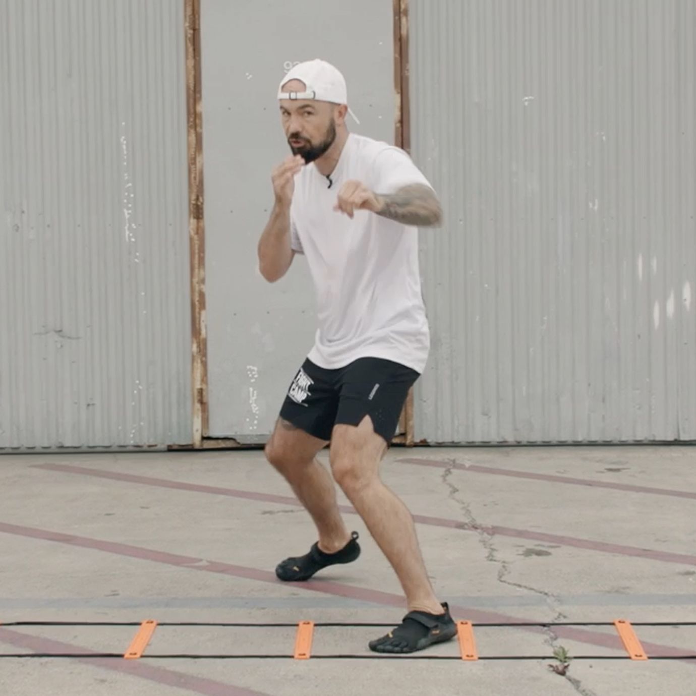 Aaron Swenson Doing a Step Jab Agility Ladder Drill