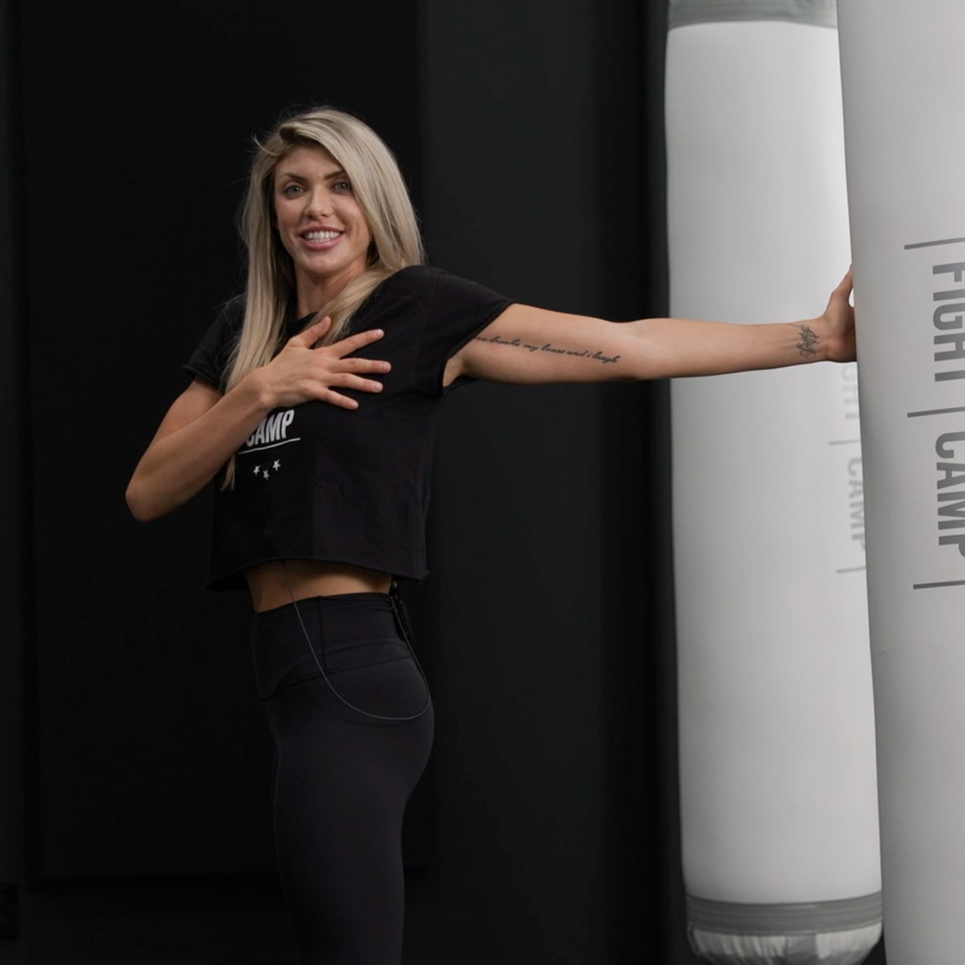 Shanie Smash Doing a Chest Pull Stretch