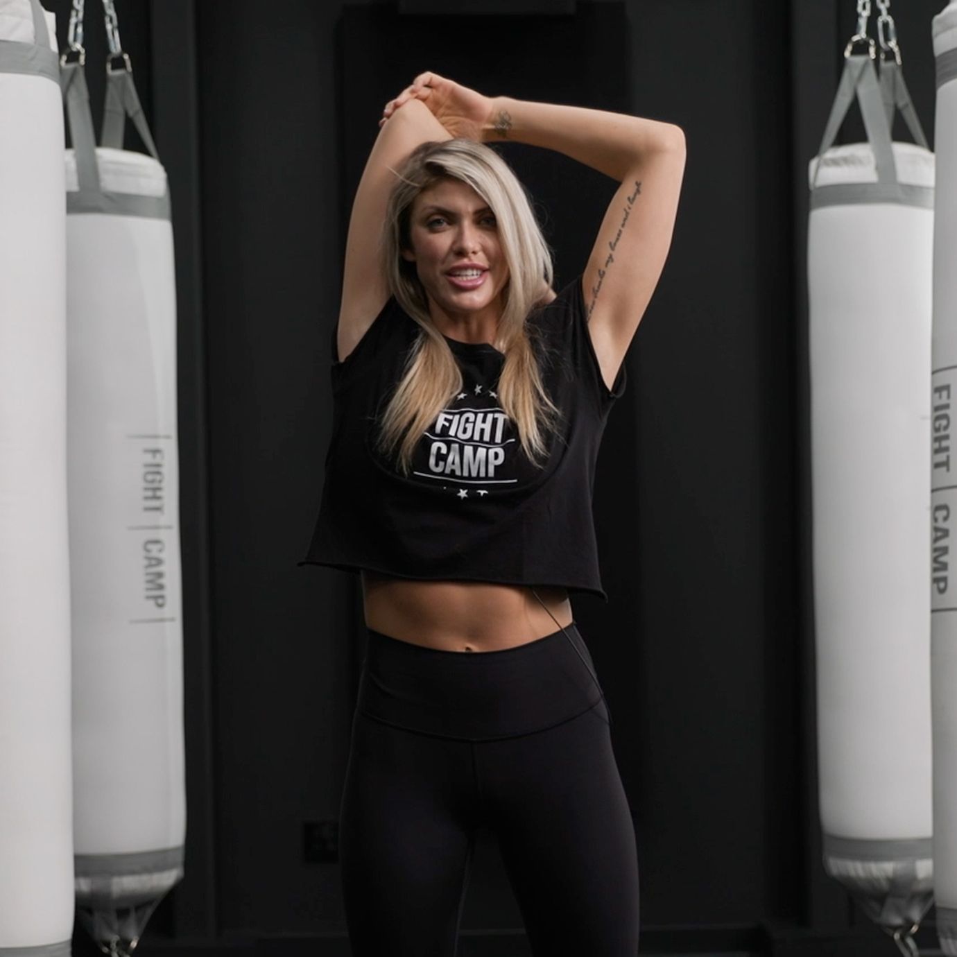 Shanie Smash Doing a Tricep Pull Stretch