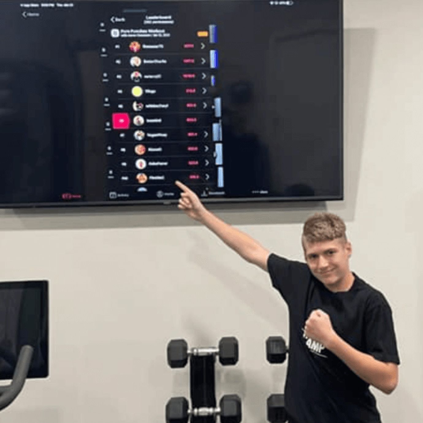 FightCamp member Amber Wooten’s son Brody Wooten showing his score on the leaderboard