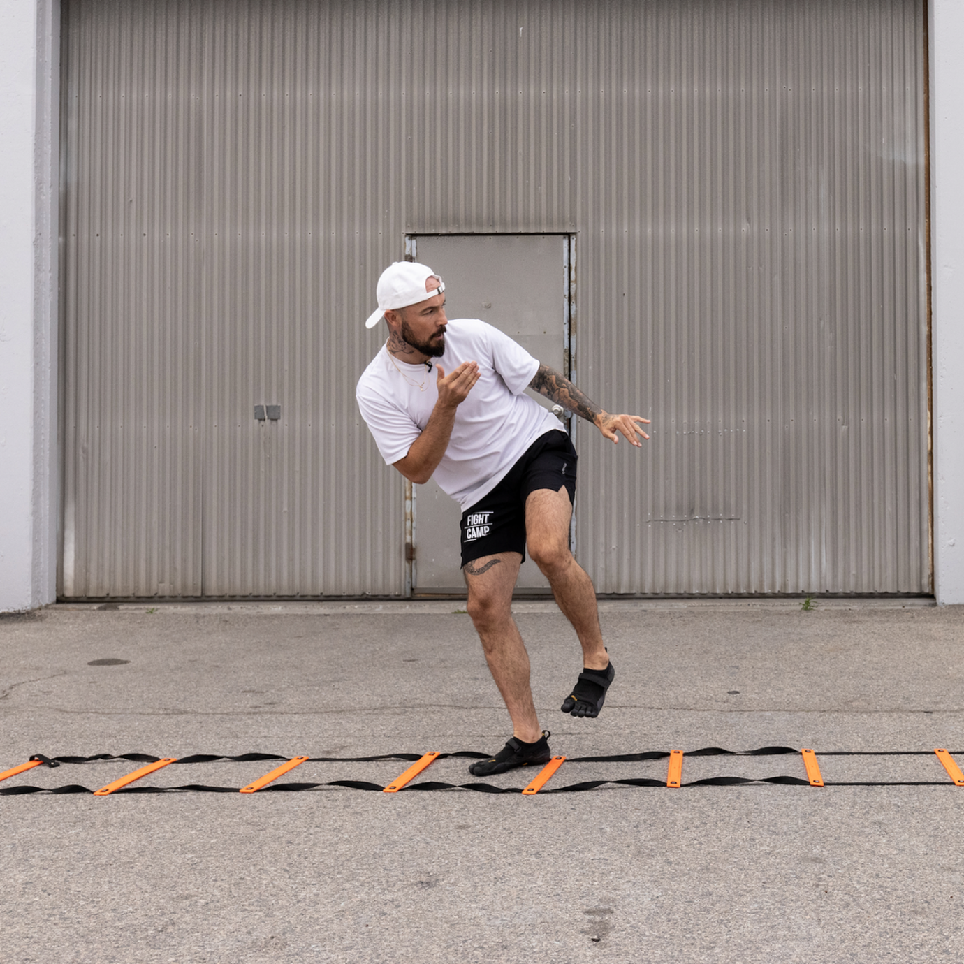 Aaron Swenson doing agility ladder drills