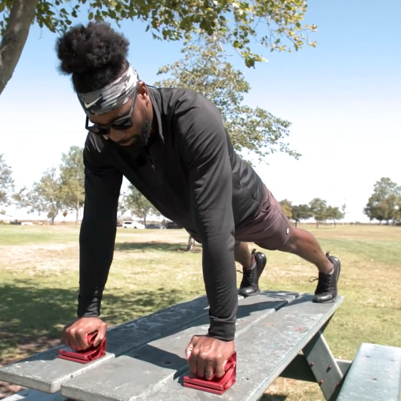 Coach PJ Doing Push-Ups With Risers