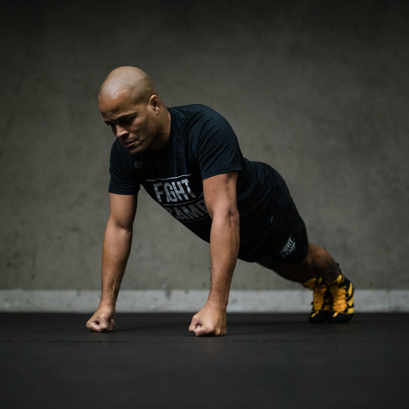 FightCamp Trainer Flo Master Doing a Plank