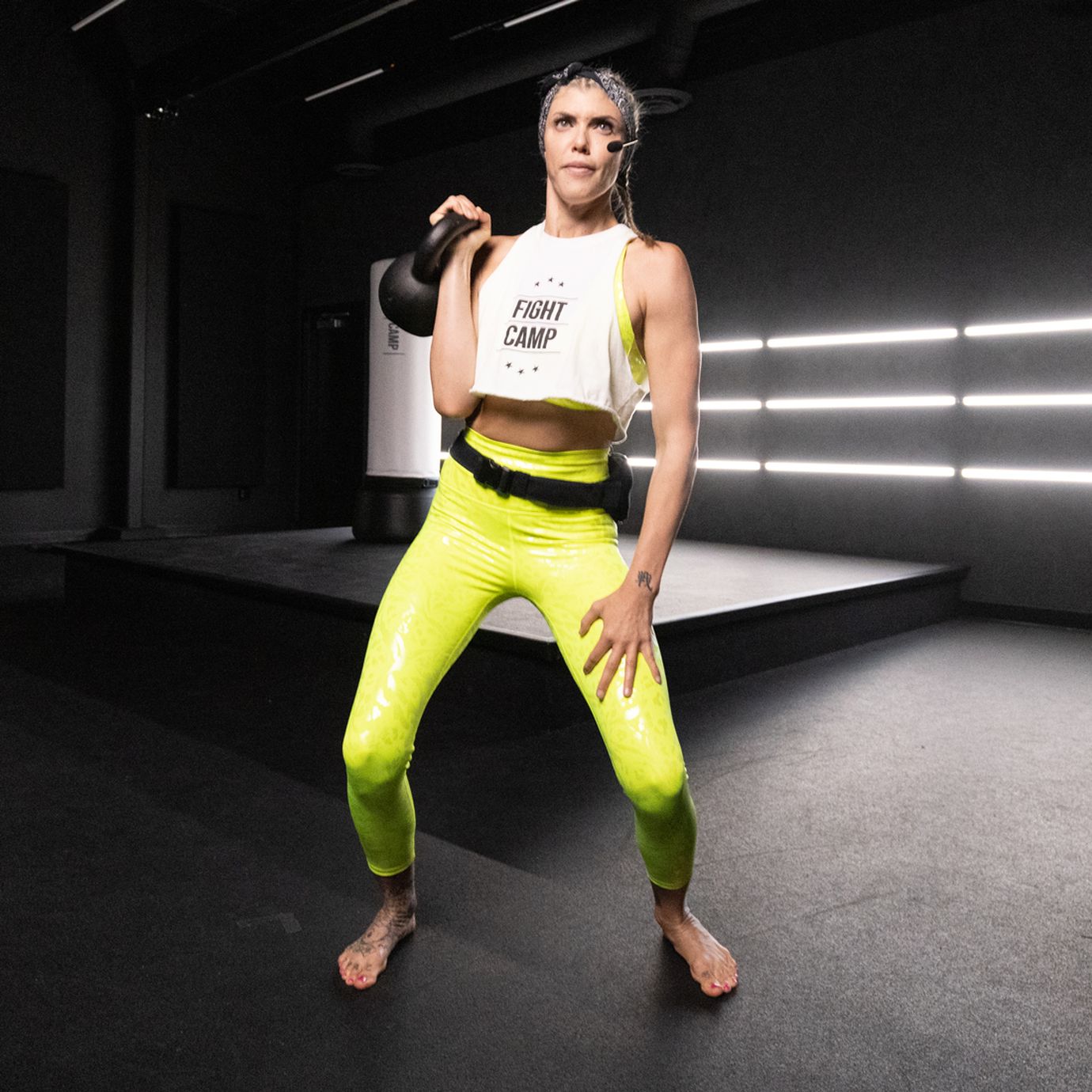Shanie Smash Executing A Kettlebell Clean and Press