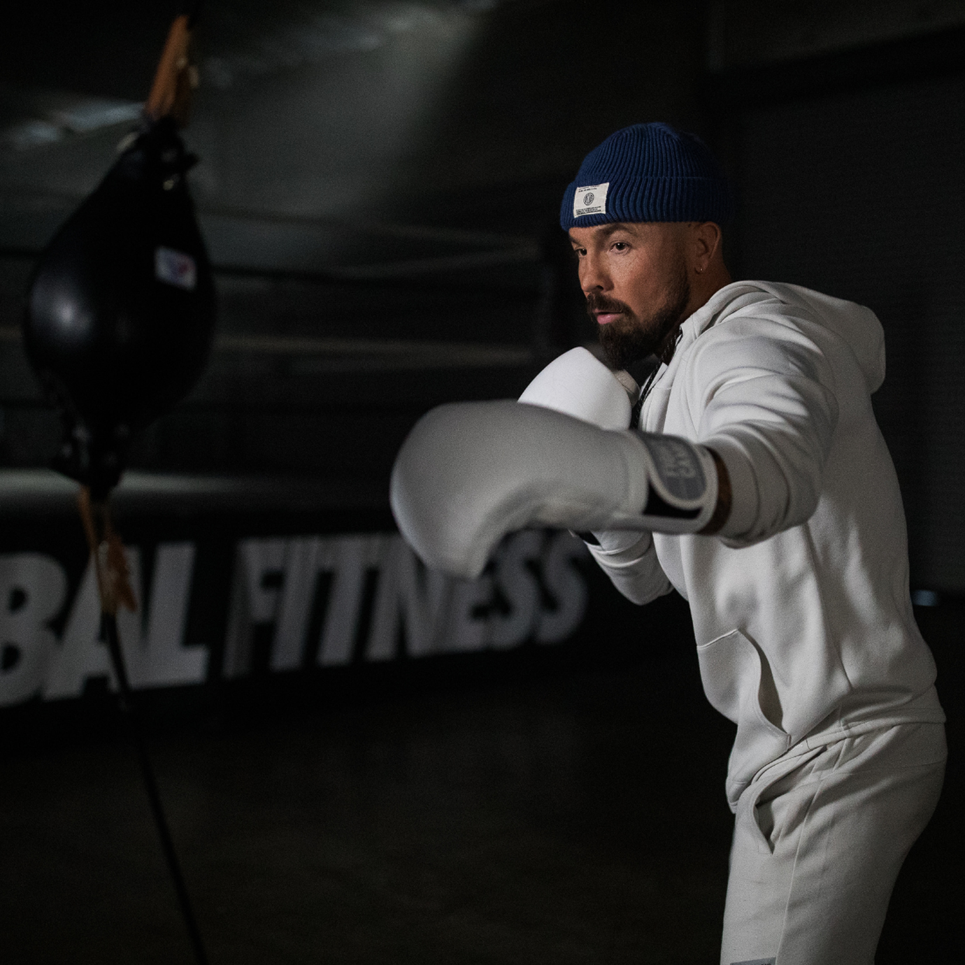 Aaron Swenson boxing with a double end bag