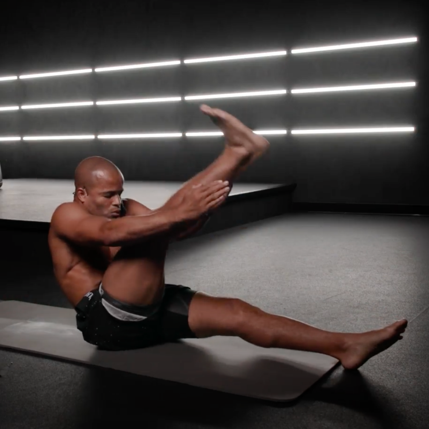 Flo Master Doing Single Leg V-Ups