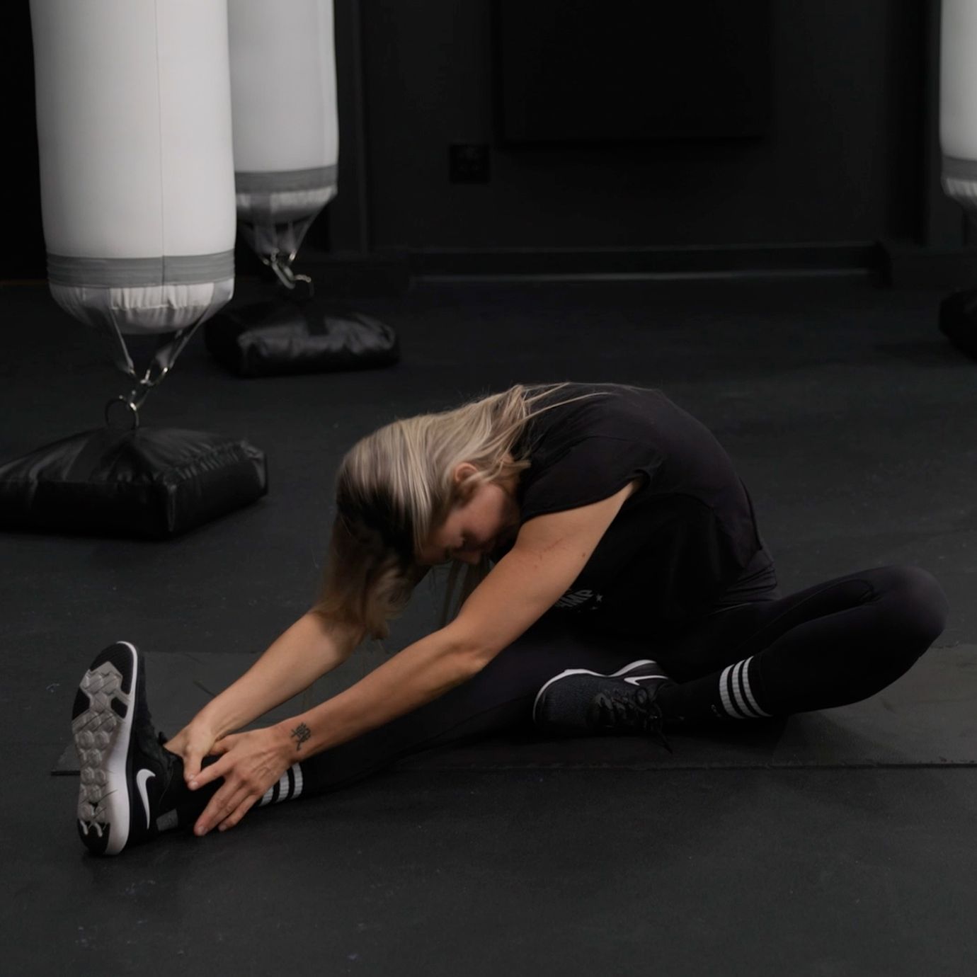 Shanie Smash Doing a One Leg In, One Leg Out Stretch