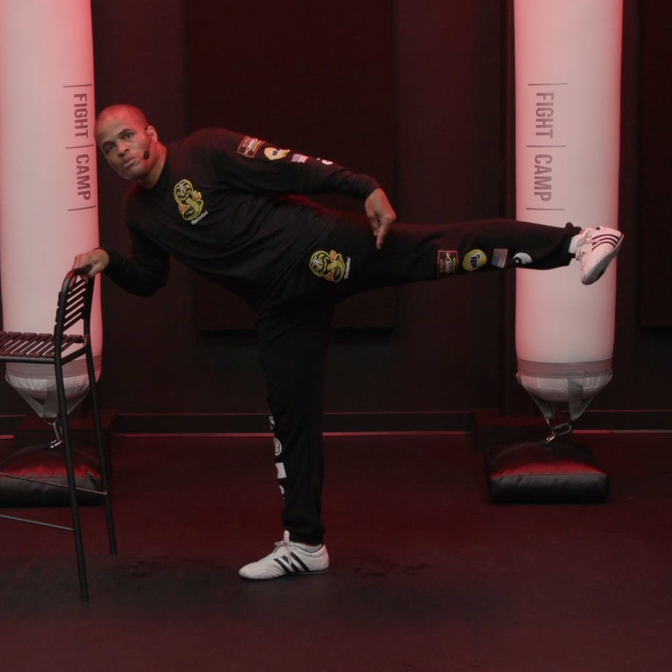 Flo Master Doing Side Kicks