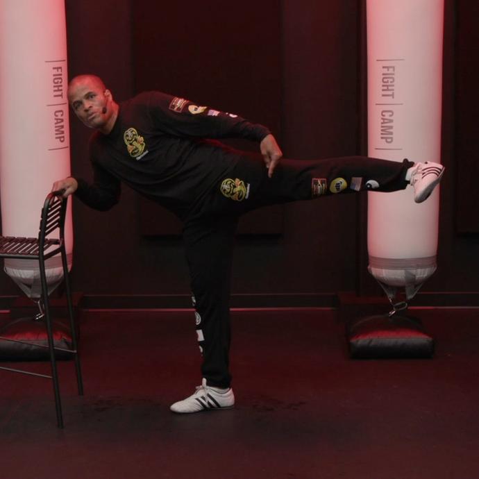 Flo Master Doing Side Kicks