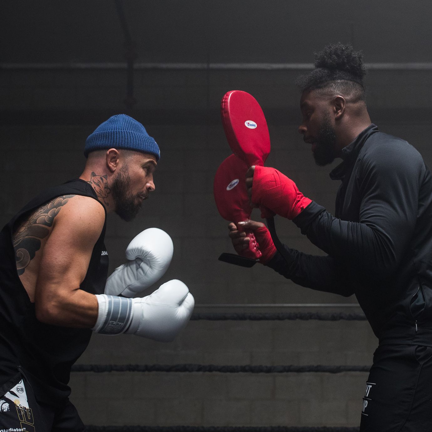 Aaron Swenson & Coach PJ Doing Boxing Paddle Work