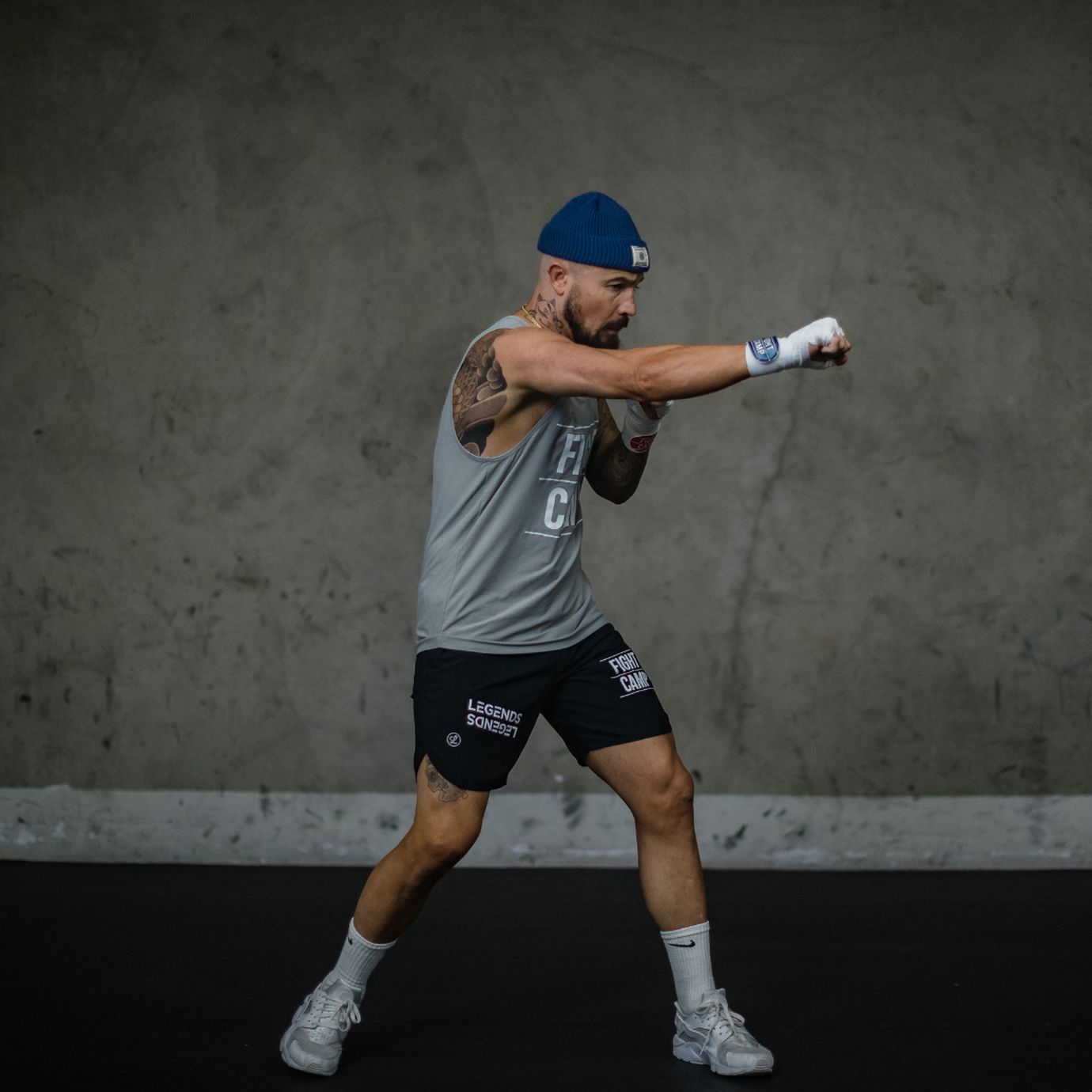 FightCamp Trainer Aaron Swenson Throwing a Cross Punch