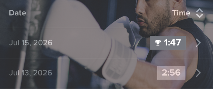 A boxer wearing gloves, visible in the background, with a digital interface in the foreground displaying dates and times in July 2026.