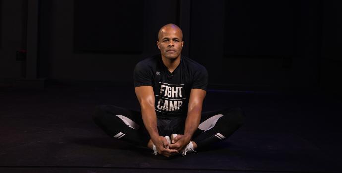 Flo Master Doing a Butterfly Stretch