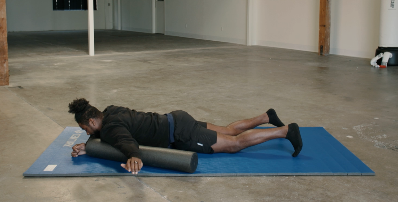 Coach PJ Doing Chest/Deltoid Foam Rolls