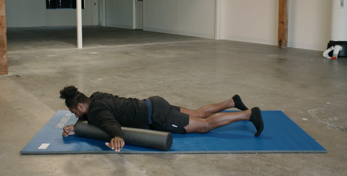 Coach PJ Doing Chest/Deltoid Foam Rolls