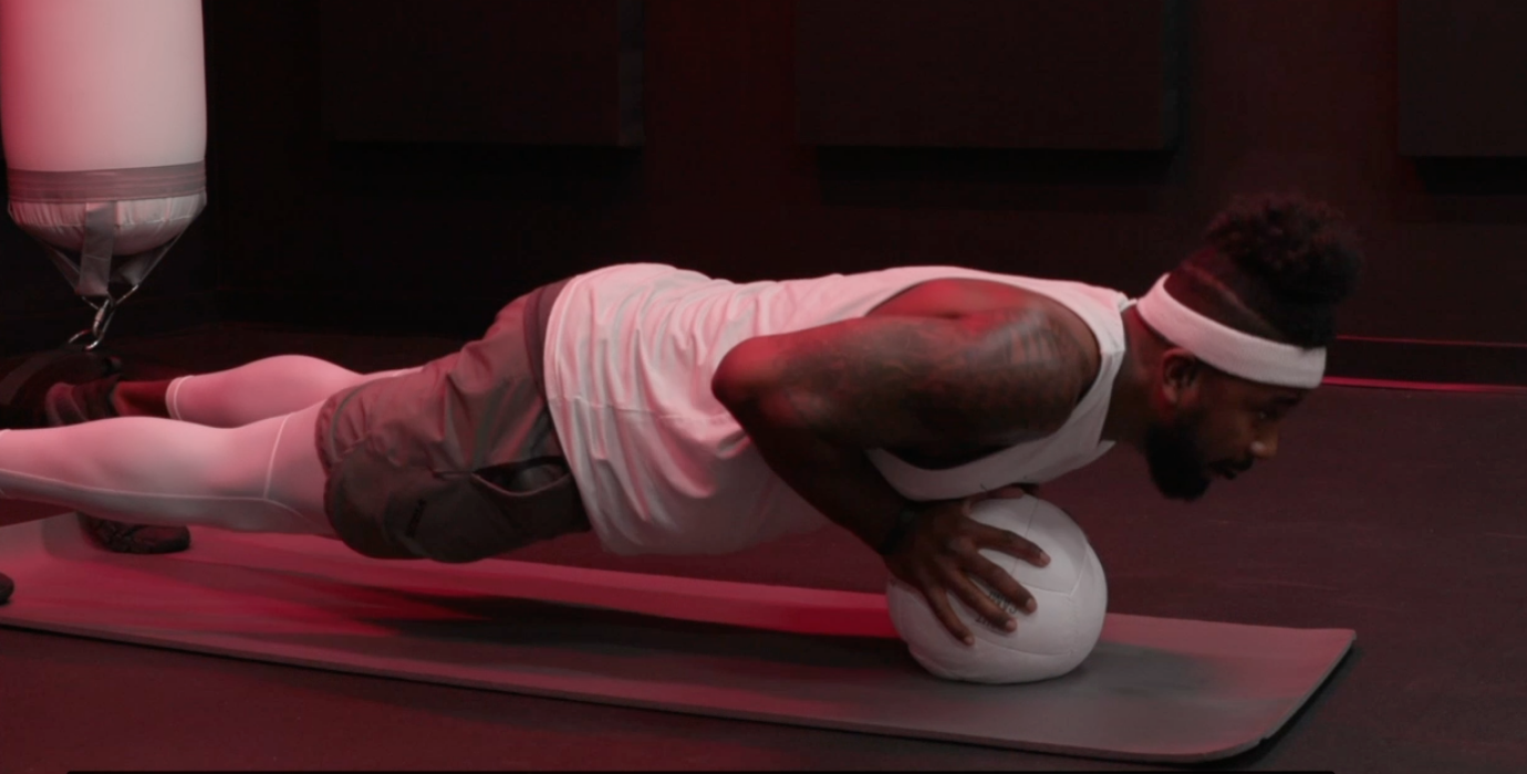 Coach PJ Doing a Medicine Ball Push-Up