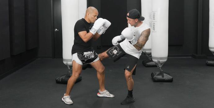 Aaron Swenson Doing a Low Kick